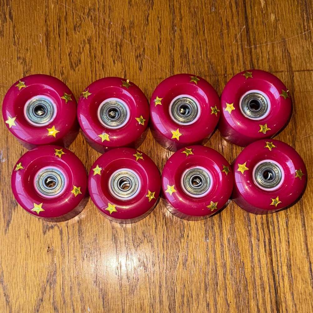 Red 52mm Roller skate Wheels with Yellow Stars set of 8 ABEC-5